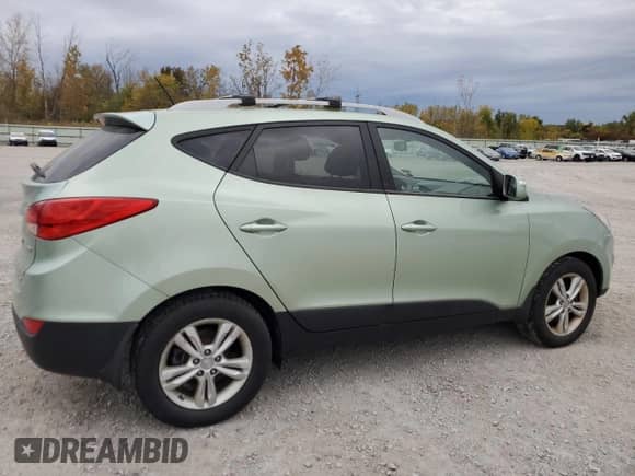 2012 Hyundai Tucson GLS with VIN KM8JUCAC7CU419152, listed as a Copart auction lot 85339515 with 144,345 mi miles and Clean title. Bid and sale history available at DreamBid. Image 3.