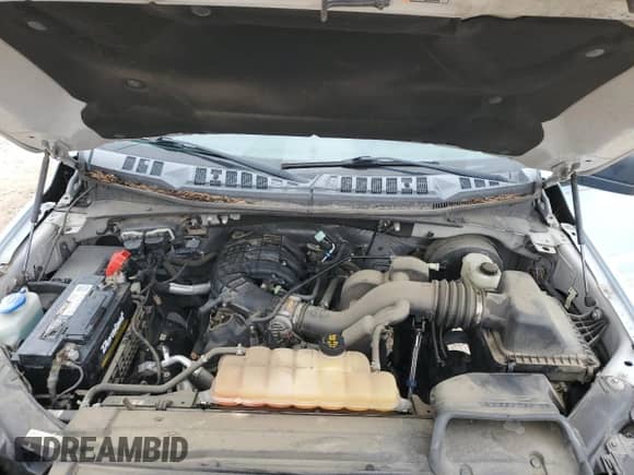 2016 Ford F-150 XL с VIN 1FTMF1C85GKE57165, выставлен на аукционе Copart как лот 71002545 с пробегом 102 436 миль миль и Списание • Salvage title. История ставок и продаж доступна на DreamBid. Изображение 11.