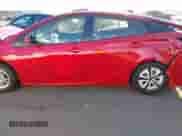 2021 Toyota Prius L Eco with VIN JTDKAMFU6M3152201, listed as a IAAI auction lot 43278670 with 144,414 mi miles and . Bid and sale history available at DreamBid. Image 14.