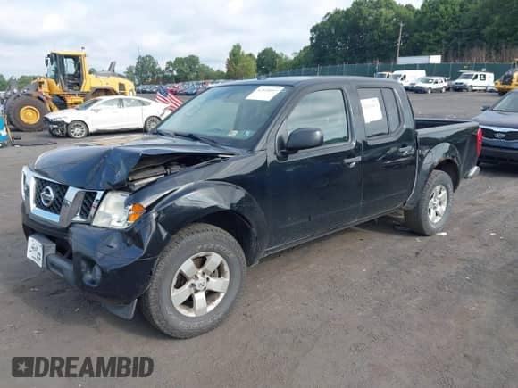 2013 Nissan Frontier SV with VIN 1N6AD0EV3DN719276, listed as a IAAI auction lot 42818053 with 163,201 mi miles and . Bid and sale history available at DreamBid. Image 2.