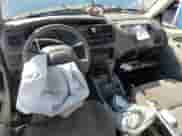 2003 Chevrolet Tracker z VIN 2CNBE13C736912038, wystawiony jako Copart lot #80422844 z przebiegiem 242 512 mil mil oraz Szkoda całkowita • Salvage title. Historia ofert i sprzedaży dostępna na DreamBid. Obrazek 8.