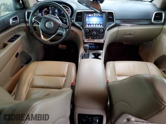 2017 Jeep Grand Cherokee Limited with VIN 1C4RJFBT6HC818003, listed as a Copart auction lot 65321975 with 136,803 mi miles and Salvage title. Bid and sale history available at DreamBid. Image 8.