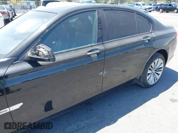 2009 BMW 7 Series 750i with VIN WBAKA83509CY34015, listed as a IAAI auction lot 42466113 with 184,076 mi miles and . Bid and sale history available at DreamBid. Image 6.