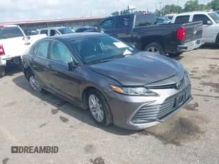 2021 Toyota Camry LE with VIN 4T1C11AK6MU594216, listed as a IAAI auction lot 42732884 with 102,694 mi miles and . Bid and sale history available at DreamBid. Image 1.