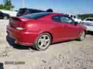 2005 Hyundai Tiburon GT с VIN KMHHN65F85U182644, выставлен на аукционе Copart как лот 63826104 с пробегом 100 245 миль миль и Списание • Salvage title. История ставок и продаж доступна на DreamBid. Изображение 3.