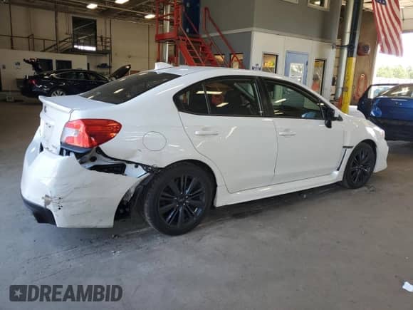 2021 Subaru WRX with VIN JF1VA1A6XM9818869, listed as a Copart auction lot 55393895 with 73,385 mi miles and Salvage title. Bid and sale history available at DreamBid. Image 3.