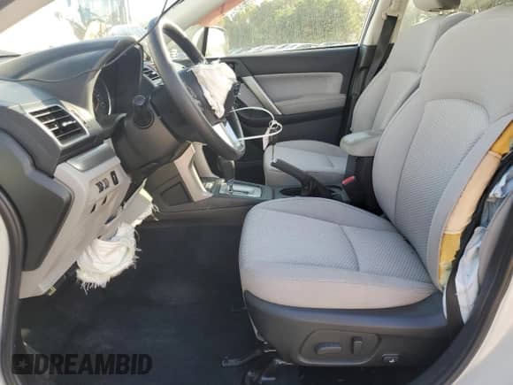 2018 Subaru Forester Premium with VIN JF2SJAEC1JH547152, listed as a Copart auction lot 82188835 with 73,656 mi miles and Salvage title. Bid and sale history available at DreamBid. Image 7.