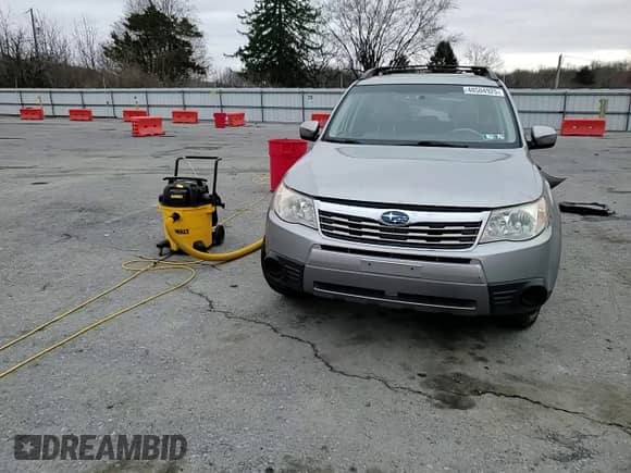 2009 Subaru Forester X with VIN JF2SH63629G721799, listed as a Copart auction lot 48504925 with 129,880 mi miles and Salvage title. Bid and sale history available at DreamBid. Image 12.