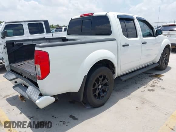 2018 Nissan Frontier SV with VIN 1N6AD0ER2JN731708, listed as a IAAI auction lot 42714834 with 77,676 mi miles and . Bid and sale history available at DreamBid. Image 4.