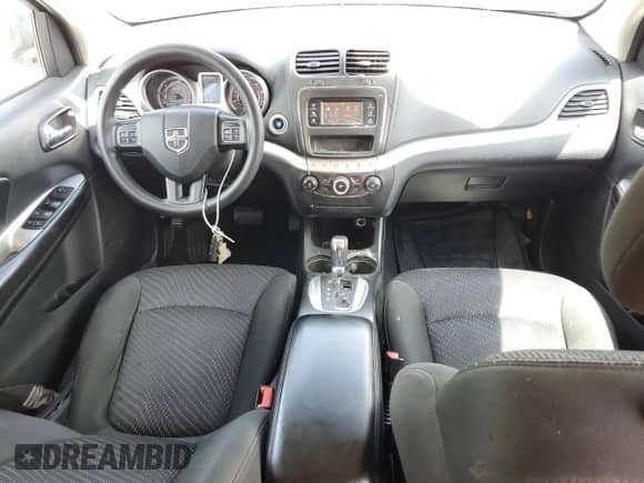 2012 Dodge Journey SXT z VIN 3C4PDCBG4CT135004, wystawiony jako Copart lot #68670485 z przebiegiem 202 652 mil mil oraz Szkoda całkowita • Salvage title. Historia ofert i sprzedaży dostępna na DreamBid. Obrazek 8.