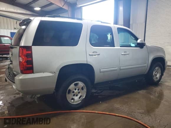 2014 Chevrolet Tahoe LS с VIN 1GNSKAE06ER156894, выставлен на аукционе Copart как лот 85503935 с пробегом 105 404 миль миль и Списание • Salvage title. История ставок и продаж доступна на DreamBid. Изображение 3.