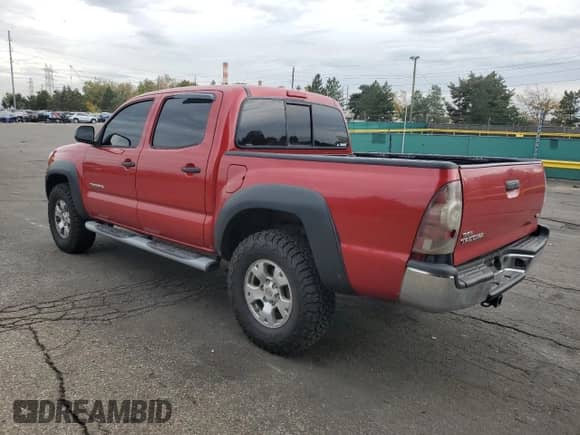 2009 Toyota Tacoma with VIN 5TELU42N09Z638120, listed as a Copart auction lot 85940075 with 241,433 mi miles and Salvage title. Bid and sale history available at DreamBid. Image 2.