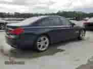 2014 BMW 7 Series 750i xDrive with VIN WBAYB6C53ED224559, listed as a Copart auction lot 58124485 with 114,753 mi miles and Salvage title. Bid and sale history available at DreamBid. Image 3.