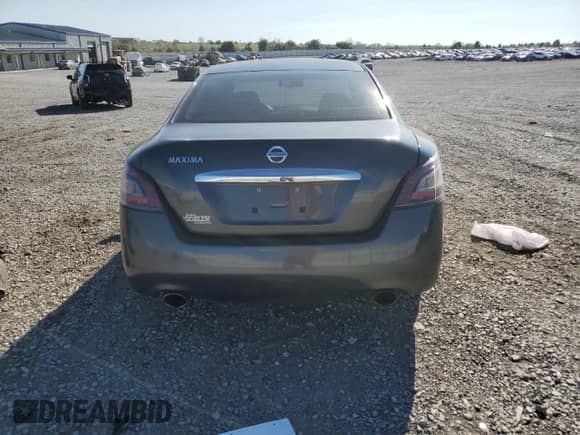 2013 Nissan Maxima S с VIN 1N4AA5AP6DC820118, выставлен на аукционе Copart как лот 71754405 с пробегом 178 679 миль миль и Списание • Salvage title. История ставок и продаж доступна на DreamBid. Изображение 6.