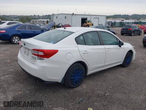 2017 Subaru Impreza with VIN 4S3GKAA67H3615642, listed as a IAAI auction lot 43340912 with 83,551 mi miles and . Bid and sale history available at DreamBid. Image 4.