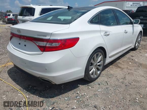2017 Hyundai Azera Limited z VIN KMHFH4JGXHA588500, wystawiony jako IAAI lot #42888010 z przebiegiem 131 310 mil mil oraz . Historia ofert i sprzedaży dostępna na DreamBid. Obrazek 4.