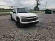 2008 Chevrolet Colorado Work Truck z VIN 1GCDT149388160569, wystawiony jako Copart lot #67165585 z przebiegiem 203 286 mil mil oraz Szkoda całkowita • Salvage title. Historia ofert i sprzedaży dostępna na DreamBid. Obrazek 13.