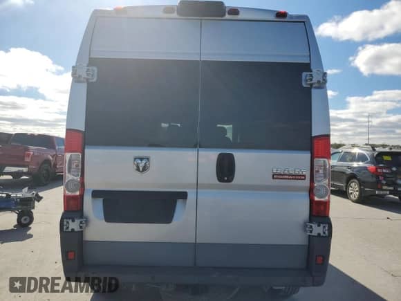 2016 Ram ProMaster Cargo with VIN 3C6TRVDG3GE106328, listed as a Copart auction lot 87297454 with 117,515 mi miles and Salvage title. Bid and sale history available at DreamBid. Image 6.