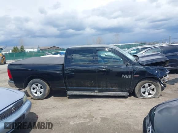 2019 Ram 1500 SLT z VIN 1C6RR7TT5KS689558, wystawiony jako IAAI lot #42041879 z przebiegiem 79 018 mil mil oraz . Historia ofert i sprzedaży dostępna na DreamBid. Obrazek 13.