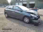 2012 Hyundai Accent GS with VIN KMHCT5AE7CU011159, listed as a Copart auction lot 70052815 with 156,055 mi miles and Salvage title. Bid and sale history available at DreamBid. Image 4.