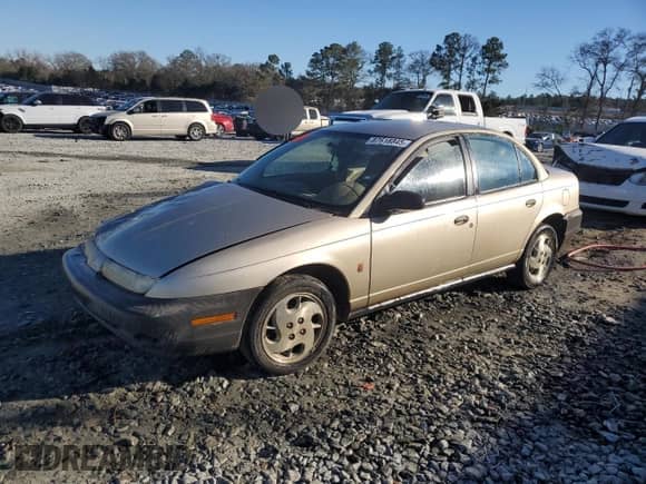 1997 Saturn SL with VIN 1G8ZH5286VZ225732, listed as a Copart auction lot 87618845 with 227,973 mi miles and Salvage title. Bid and sale history available at DreamBid. Image 1.
