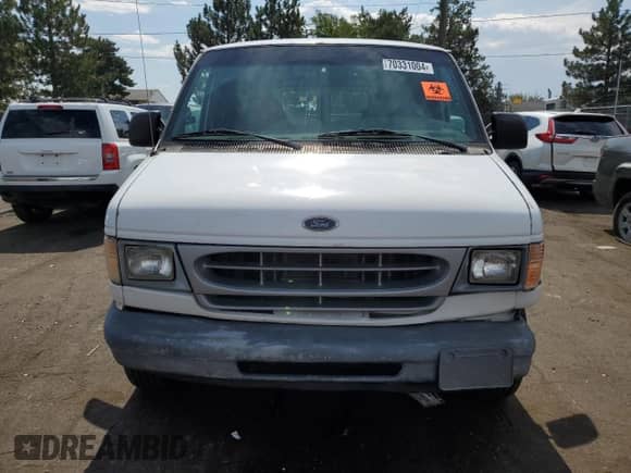 1999 Ford Econoline Cargo z VIN 1FTRE1429XHA29986, wystawiony jako Copart lot #70331004 z przebiegiem 312 901 mil mil oraz Nie do naprawy • Non repairable. Historia ofert i sprzedaży dostępna na DreamBid. Obrazek 5.
