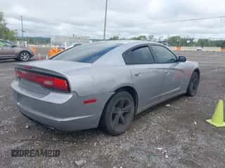 2014 Dodge Charger SE with VIN 2C3CDXBG5EH107928, listed as a IAAI auction lot 43317309 with 256,526 mi miles and . Bid and sale history available at DreamBid. Image 4.