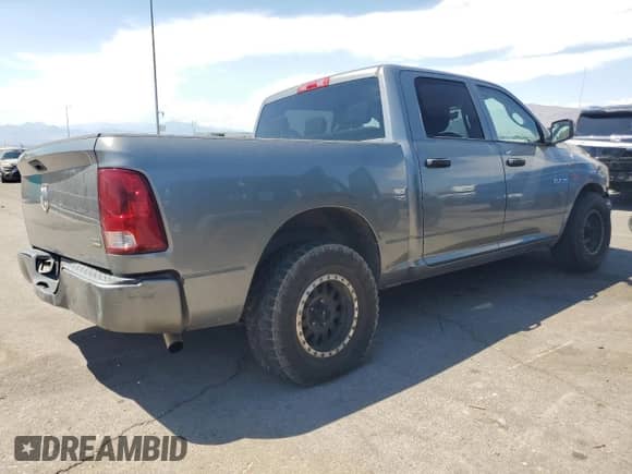 2010 Dodge 1500 TRX with VIN 1D7RB1CP8AS249528, listed as a Copart auction lot 71016725 with 167,764 mi miles and Salvage title. Bid and sale history available at DreamBid. Image 3.