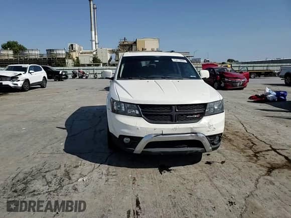 2018 Dodge Journey Crossroad with VIN 3C4PDDGGXJT504217, listed as a Copart auction lot 75477844 with 121,011 mi miles and Salvage title. Bid and sale history available at DreamBid. Image 11.