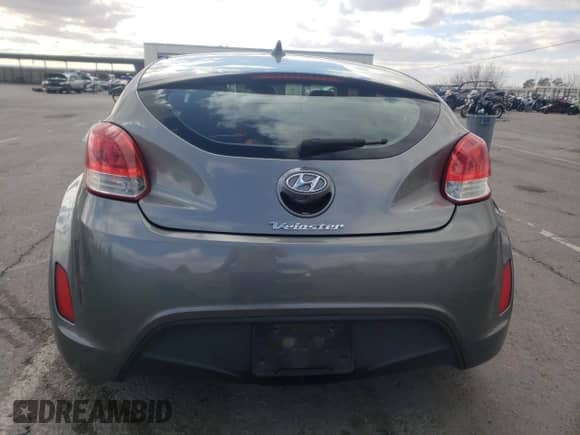 2014 Hyundai Veloster z VIN KMHTC6AD8EU194443, wystawiony jako Copart lot #60059565 z przebiegiem 201 848 mil mil oraz Szkoda całkowita • Salvage title. Historia ofert i sprzedaży dostępna na DreamBid. Obrazek 6.