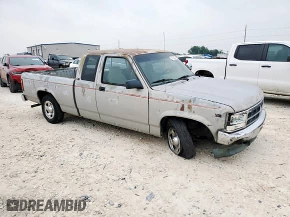 1995 Dodge Dakota с VIN 1B7GL23X4SS310105, выставлен на аукционе Copart как лот 57172375 с пробегом 164 316 миль миль и Списание • Salvage title. История ставок и продаж доступна на DreamBid. Изображение 4.