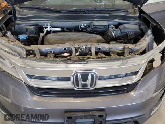 2021 Honda Pilot Touring 8-Passenger с VIN 5FNYF6H94MB034098, выставлен на аукционе Copart как лот 87397795 с пробегом 72 448 миль миль и Списание • Salvage title. История ставок и продаж доступна на DreamBid. Изображение 12.