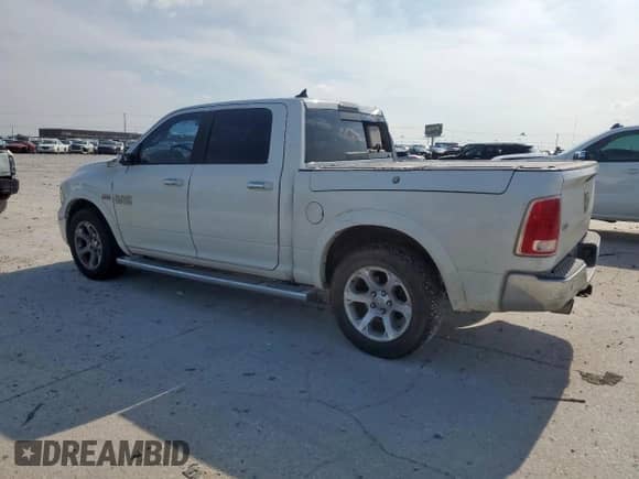2014 Ram 1500 Laramie with VIN 1C6RR6NT0ES388966, listed as a Copart auction lot 59334475 with 302,512 mi miles and Salvage title. Bid and sale history available at DreamBid. Image 2.