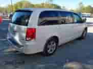 2013 Dodge Grand Caravan SE with VIN 2C4RDGBG0DR811629, listed as a IAAI auction lot 43381534 with 84,399 mi miles and . Bid and sale history available at DreamBid. Image 4.
