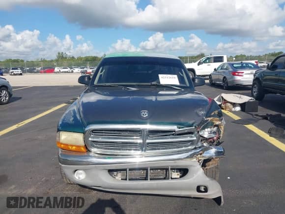 2003 Dodge Dakota SLT z VIN 1D7HL48N63S126377, wystawiony jako IAAI lot #42512610 z przebiegiem 202 720 mil mil oraz . Historia ofert i sprzedaży dostępna na DreamBid. Obrazek 12.