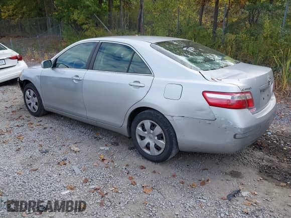 2007 Toyota Camry CE z VIN 4T1BE46K07U506100, wystawiony jako IAAI lot #43371728 z przebiegiem 103 537 mil mil oraz . Historia ofert i sprzedaży dostępna na DreamBid. Obrazek 3.