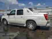 2002 Cadillac Escalade EXT with VIN 3GYEK63N62G352535, listed as a Copart auction lot 65949854 with 174,828 mi miles and Salvage title. Bid and sale history available at DreamBid. Image 2.