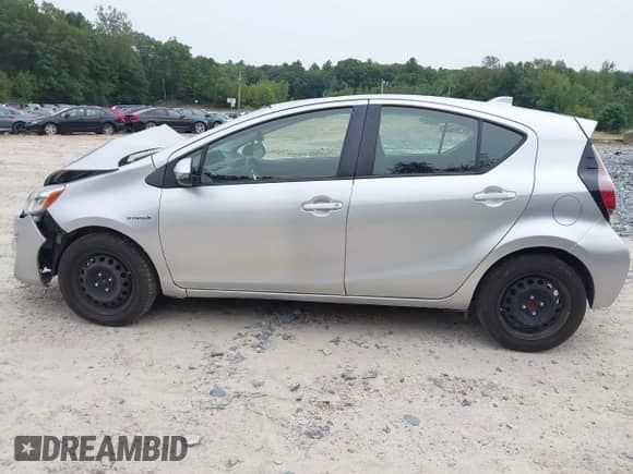 2015 Toyota Prius One z VIN JTDKDTB38F1583183, wystawiony jako IAAI lot #42905756 z przebiegiem 166 787 mil mil oraz . Historia ofert i sprzedaży dostępna na DreamBid. Obrazek 14.