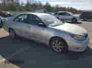 2005 Toyota Camry XLE with VIN 4T1BF30K05U595874, listed as a Copart auction lot 84923435 with 194,695 mi miles and Salvage title. Bid and sale history available at DreamBid. Image 4.