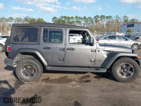 2022 Jeep Wrangler Unlimited Sport with VIN 1C4HJXDG1NW167066, listed as a IAAI auction lot 41572221 with 48,356 mi miles and . Bid and sale history available at DreamBid. Image 12.
