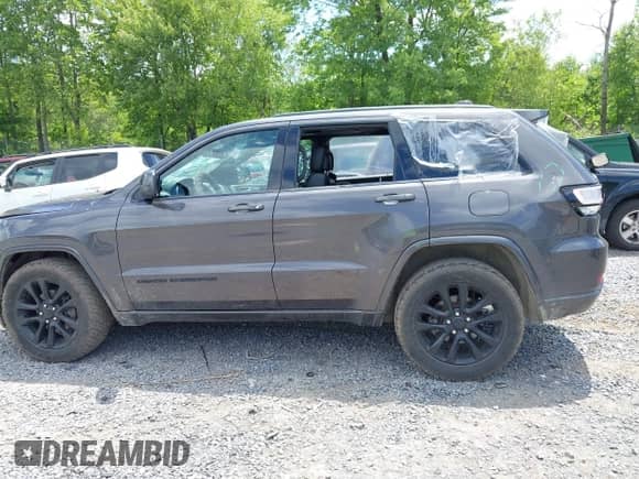 2020 Jeep Grand Cherokee Laredo E with VIN 1C4RJFAG3LC222232, listed as a IAAI auction lot 42636691 with 94,553 mi miles and . Bid and sale history available at DreamBid. Image 14.
