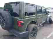 2022 Jeep Wrangler Unlimited Sahara with VIN 1C4JJXP67NW275731, listed as a IAAI auction lot 42992514 with 32,279 mi miles and . Bid and sale history available at DreamBid. Image 4.