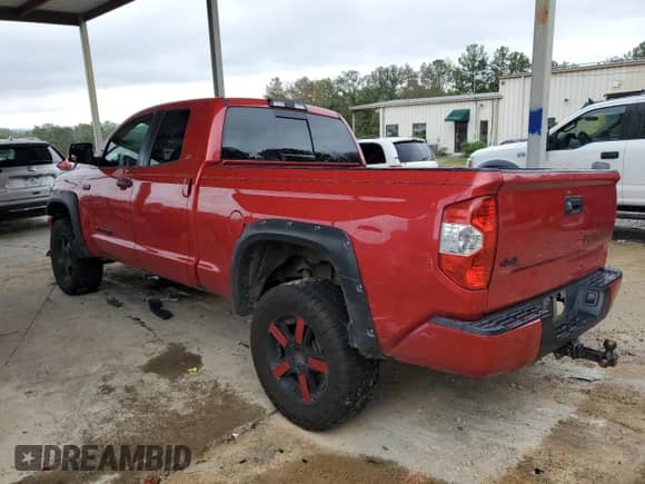 2017 Toyota Tundra SR with VIN 5TFUW5F16HX635935, listed as a Copart auction lot 82652525 with 277,111 mi miles and Salvage title. Bid and sale history available at DreamBid. Image 2.