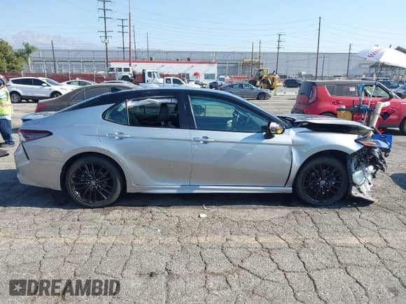 2023 Toyota Camry Hybrid XSE with VIN 4T1K31AK0PU051132, listed as a IAAI auction lot 42945793 with 48,781 mi miles and . Bid and sale history available at DreamBid. Image 14.