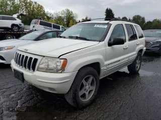 2001 Jeep Grand Cherokee Limited с VIN 1J4GW58NX1C616583, выставлен на аукционе Copart как лот 82163105 с пробегом 168 698 миль миль и Чистый • Clean title. История ставок и продаж доступна на DreamBid. Изображение 1.