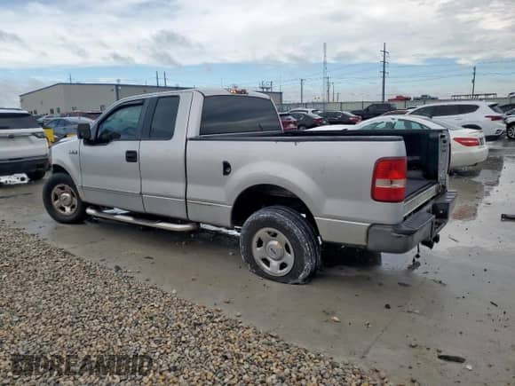2005 Ford F-150 STX with VIN 1FTRX12W75FB67860, listed as a Copart auction lot 81758305 with 325,267 mi miles and Salvage title. Bid and sale history available at DreamBid. Image 2.