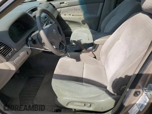 2002 Toyota Camry XLE with VIN 4T1BF32K42U025479, listed as a Copart auction lot 71116785 with 241,787 mi miles and Salvage title. Bid and sale history available at DreamBid. Image 7.