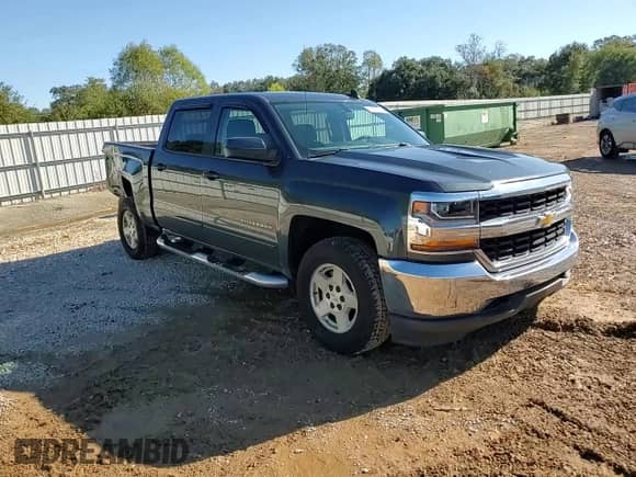 2018 Chevrolet Silverado 1500 LT z VIN 3GCUKREH7JG324428, wystawiony jako Copart lot #81501324 z przebiegiem 103 304 mil mil oraz Szkoda całkowita • Salvage title. Historia ofert i sprzedaży dostępna na DreamBid. Obrazek 11.