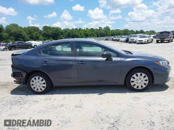 2017 Subaru Impreza with VIN 4S3GKAA66H3623182, listed as a IAAI auction lot 42571573 with 105,112 mi miles and . Bid and sale history available at DreamBid. Image 13.