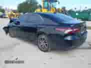 2021 Toyota Camry Hybrid XLE with VIN 4T1F31AK2MU029260, listed as a IAAI auction lot 42639954 with 59,325 mi miles and . Bid and sale history available at DreamBid. Image 3.